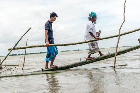 Dohar, Bangladesh - August 5, 2016: Heavy flooding from monsoon rain and tide from river in Dohar, Bangladesh on August 5, 2016のeditorial素材