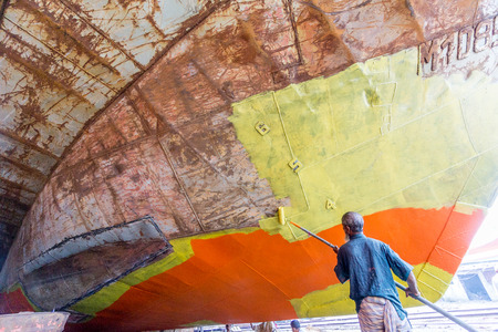 DHAKA, BANGLADESH - August 12: Local workers are working to repair ships in dockyard on August, 12, 2016 in Dhaka, Bangladeshのeditorial素材