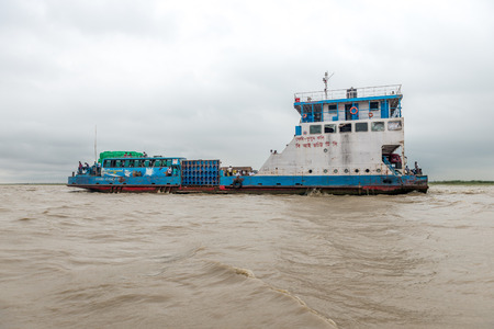Dhaka, Bangladesh - AUG 27, 2016 : passenger ferry boat in open waters on August 27, 2016 in Dhaka, Bangladeshのeditorial素材