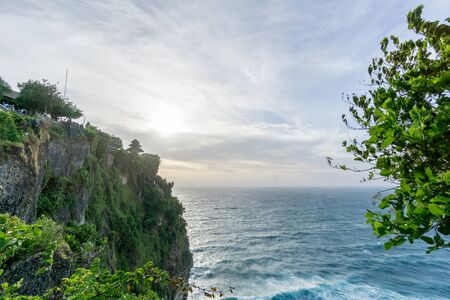 Uluwatu temple in the sea in Bali Indonesiaの写真素材