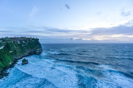 Uluwatu temple in the sea in Bali Indonesiaの写真素材