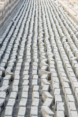 Dhaka, Bangladesh - January 21, 2017: Workers are working in Brick Field at Amin bazar, dhaka, Bangladesh.のeditorial素材