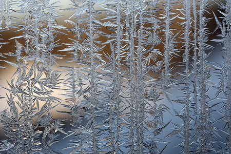 winter pattern of ice crystals on glass.
