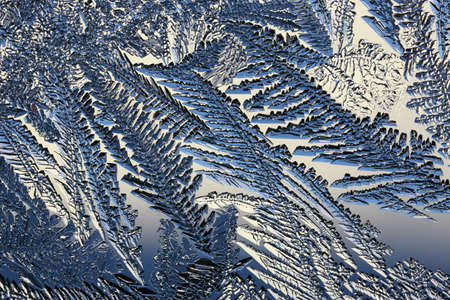 winter pattern of ice crystals on glass.