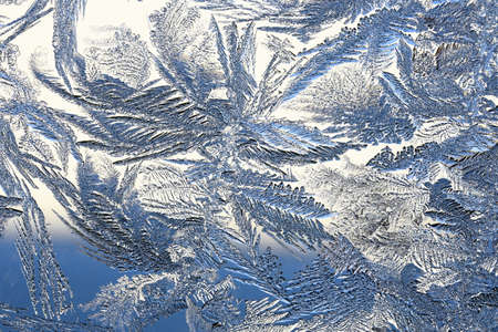 winter pattern of ice crystals on glass.の写真素材