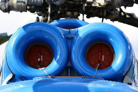 A military helicopter, the blades of a helicopter. case engine helicopters turbine.