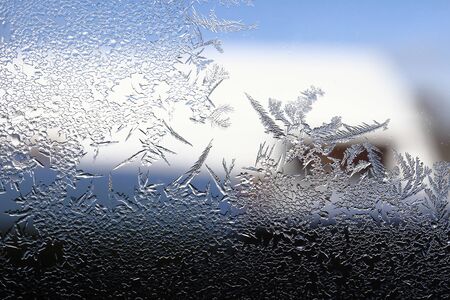 winter pattern of ice crystals on glass.