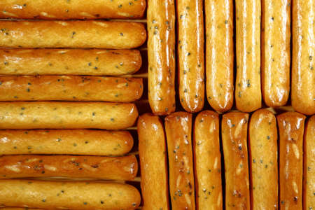 long cookies with poppy seeds close up.の写真素材