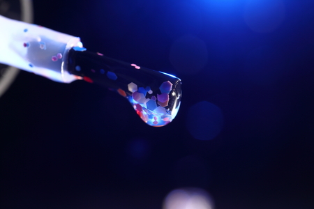 Brush with a drop of nail Polish.