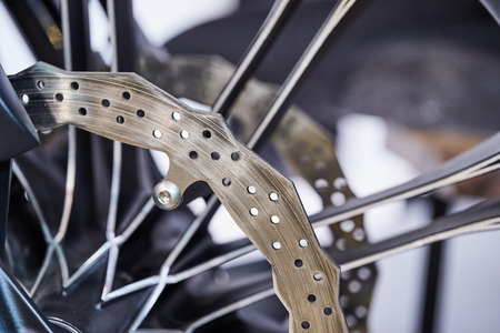 The front wheel of a modern motorcycle.の写真素材