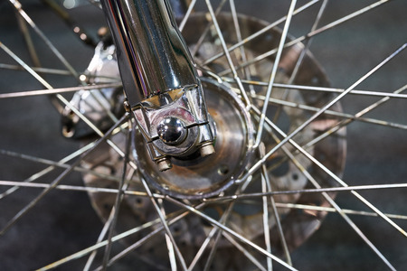 The front wheel of a modern motorcycle.