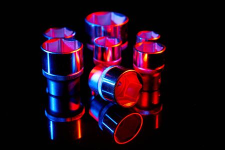Wrench heads on black background with reflections. Repair toolの写真素材