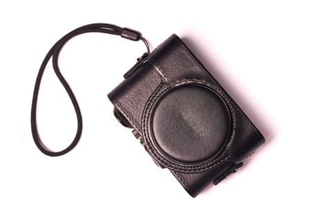 Classic compact camera in case isolated on white background.の写真素材