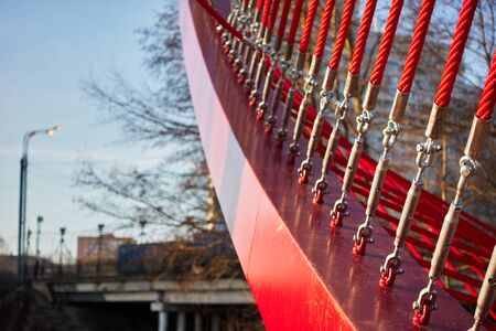 Abstract architectural features, steel beam with cables and tension elements.の写真素材