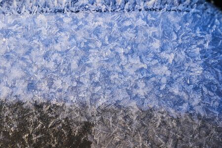 Frosty pattern on the surface in winter season.