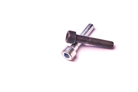 Two steel bolts isolated on white