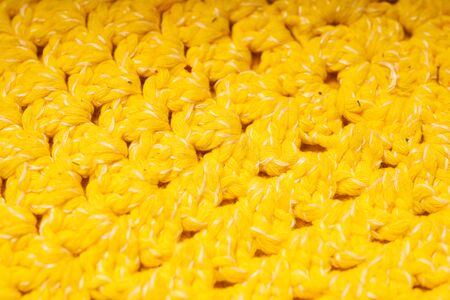 Knitted coaster lace napkin, macro shooting. Structural member, flat position.の写真素材