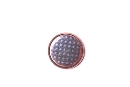 Lithium round battery isolated on white