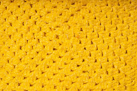 Knitted coaster lace napkin, macro shooting. Structural member, flat position.の写真素材