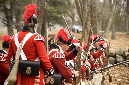 Concord, USA - April 16, 2011: British soldiers on Battle Road in Concord, MA during the...