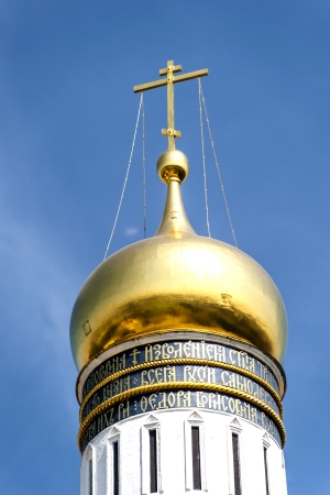 A gold dome of the Ivan the Great Bell Tower in Kremlinの写真素材