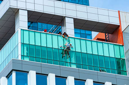 Ulan-Bator, Mongolia - August 26, 2016: Window washing of high rising buildings in the Mongolian capitol.のeditorial素材