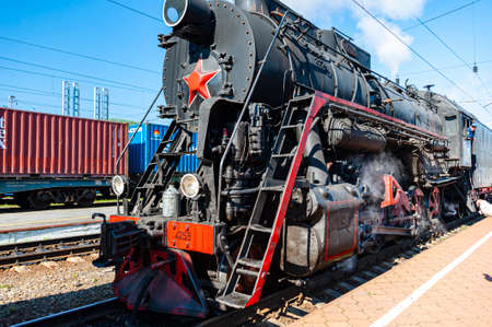 rkutsk, Russia - August 30, 2016: a retro steam train takes tourists for a journey by the Circum-Baikal Railway, a historic rail road. The Circum-Baikal is one of the picturesque sights of the area arのeditorial素材