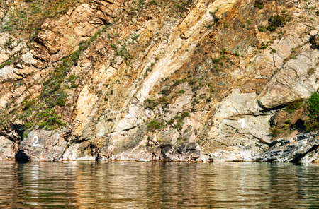 Shoreline of Lake Baikal in vicinity of the small touristy village of Listvyanka. Despite its modest size Listvyanka is one of the busiest tourist centers on Lake Baikal.の写真素材