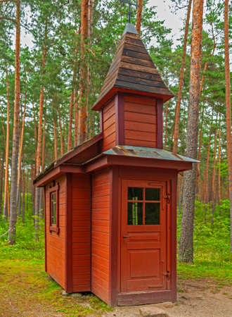 Riga, Latvia - July 29, 2019: Old wooden chapel in the Riga open-air ethnographic museum.のeditorial素材