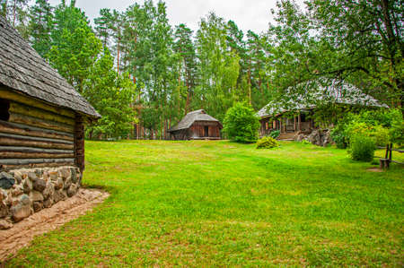 Old Latvian wooden house which represents architectural style  of the country regions.の写真素材