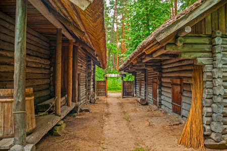 Old Latvian wooden house which represents architectural style  of the country regions.の写真素材