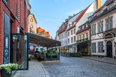 Riga, Latvia - July 30, 2019: Street scene in the Old Town. Riga is famous for its highly diverse architecture and impressive buildings. Riga historic center is included in the UNESCO World Heritage Lのeditorial素材