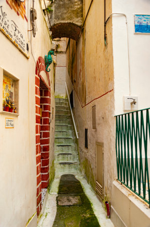 Atrani, Italy - January 19, 2017: Inside of labyrinth of medieval buildings in Atrani, a town on Amalfi coast, connected by a maze of staircases and narrow alleys.のeditorial素材