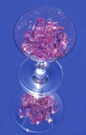 pink crystal on wine glass with the 3d reflectionの写真素材