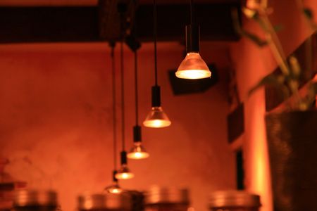 a line up of interior lights in warm coloursの写真素材