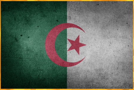 A national flag of Algeria, coloured green and white, designed with golden colours.の写真素材