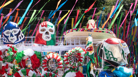 A display of Mexican masks and hats. Scene is festive and colorful. Decoration to celebrate...