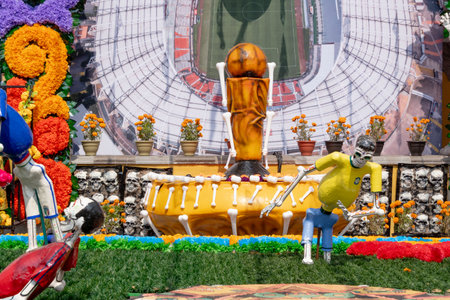 A man dressed in a yellow shirt is playing soccer with a ball. The scene is decorated with flowers.の写真素材