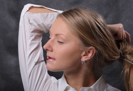 Woman let's her hair downの写真素材