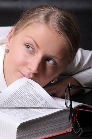 Woman with an open russian - english vocabularyの写真素材