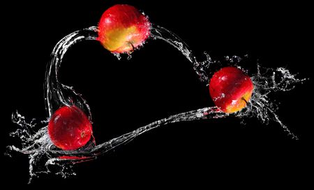 Three apples in water ringの写真素材