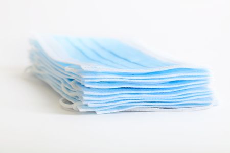 Bunch of protective masks on white