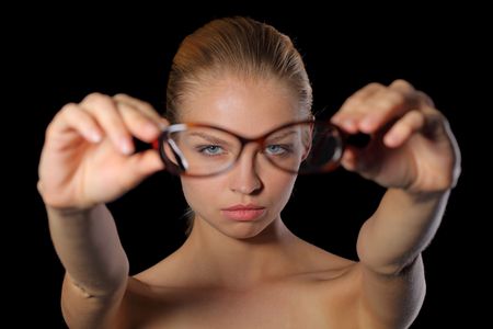 Woman holding glassesの写真素材