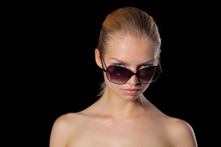 Young woman in sunglassesの写真素材