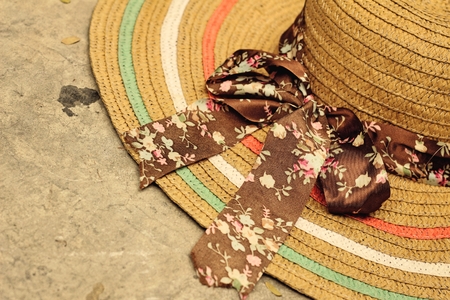 Brown straw hat and a bow on the hat.の写真素材