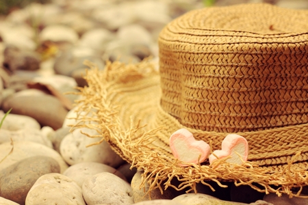 Brown straw hat and a bow on the hat.の写真素材