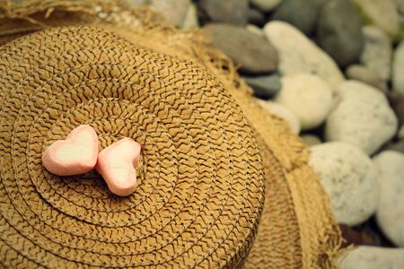 Brown straw hat and a bow on the hat.の写真素材