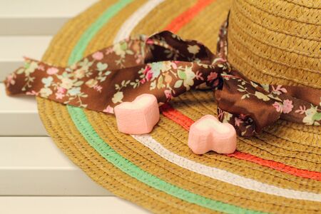 Brown straw hat and a bow on the hat.の写真素材