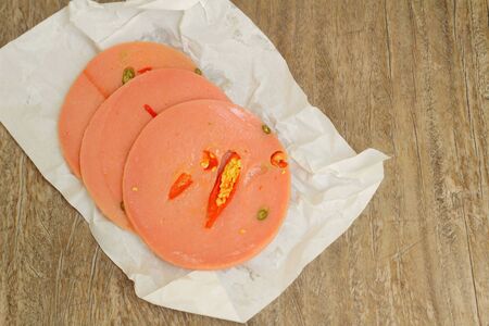 Spicy Bologna sausage on a background - foodの写真素材