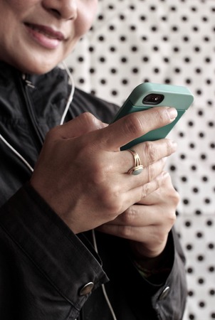 Woman using smart phoneの写真素材